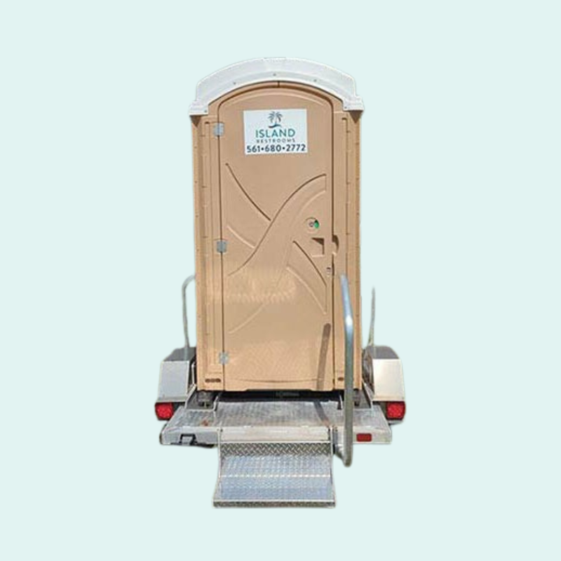 Trailer mounted portable toilet with handwash station from Island Restrooms